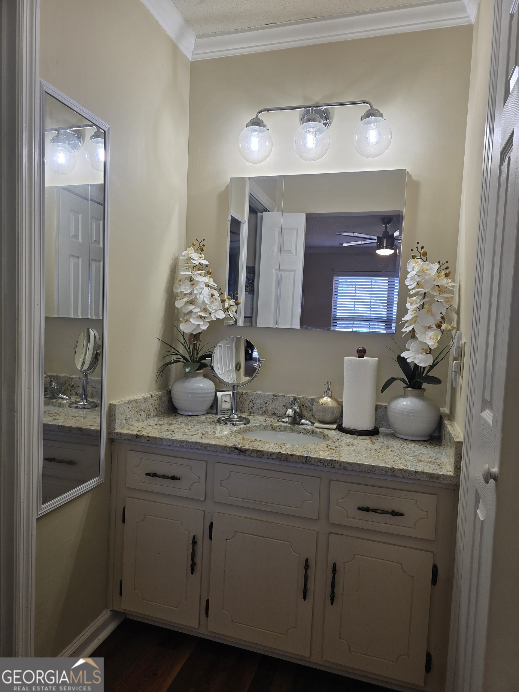 479 Mitchell Loop Bluffton, GA 39824 - Photo 24 of 51 a bathroom with a granite countertop sink and a mirror