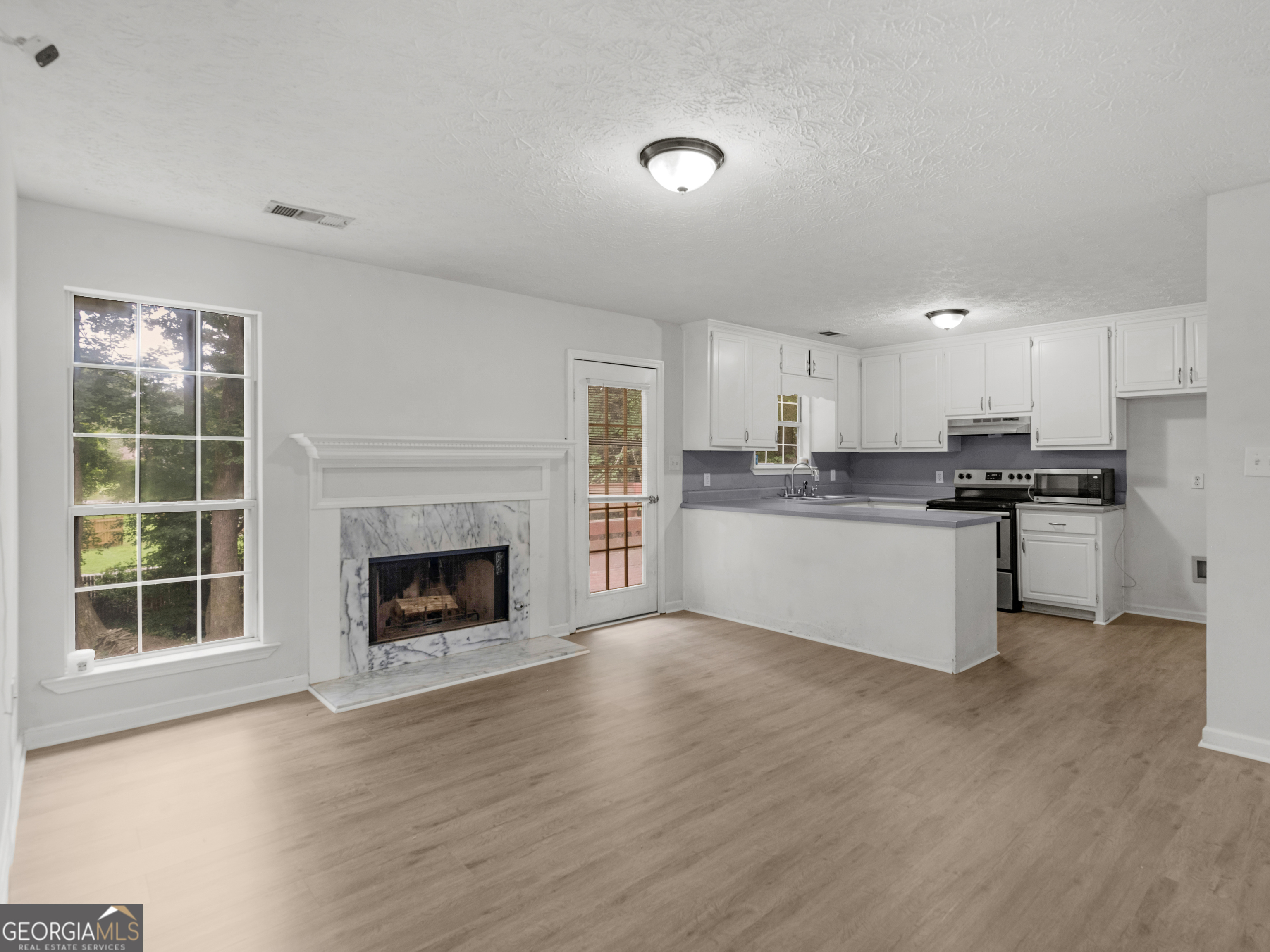 3055 Deerfield Way Rex, GA 30273 - Photo 7 of 23