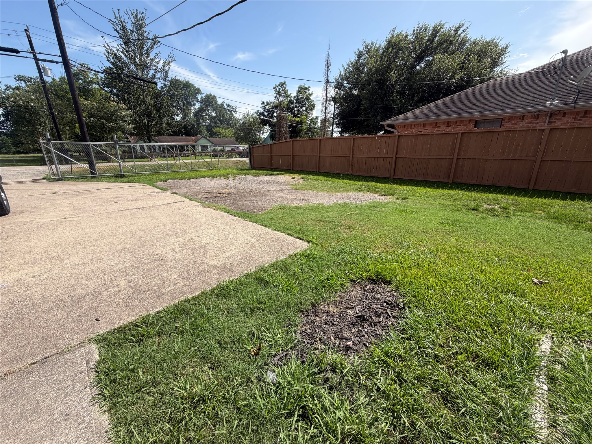 516 Battlebell Road Highlands, TX 77562 - Photo 6 of 17 a view of a backyard