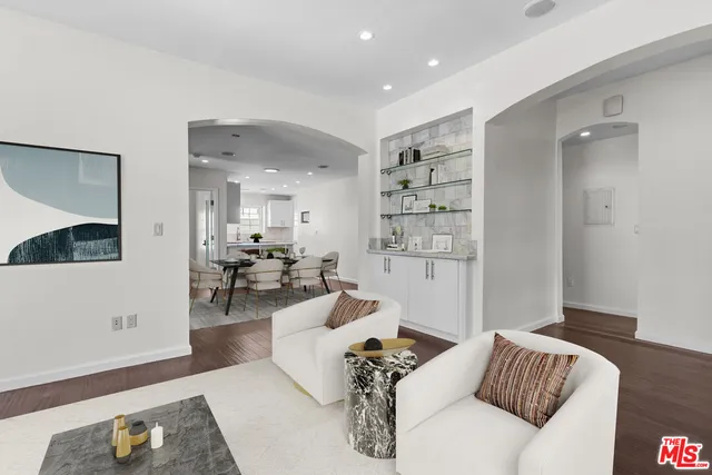 a living room with furniture and a couch