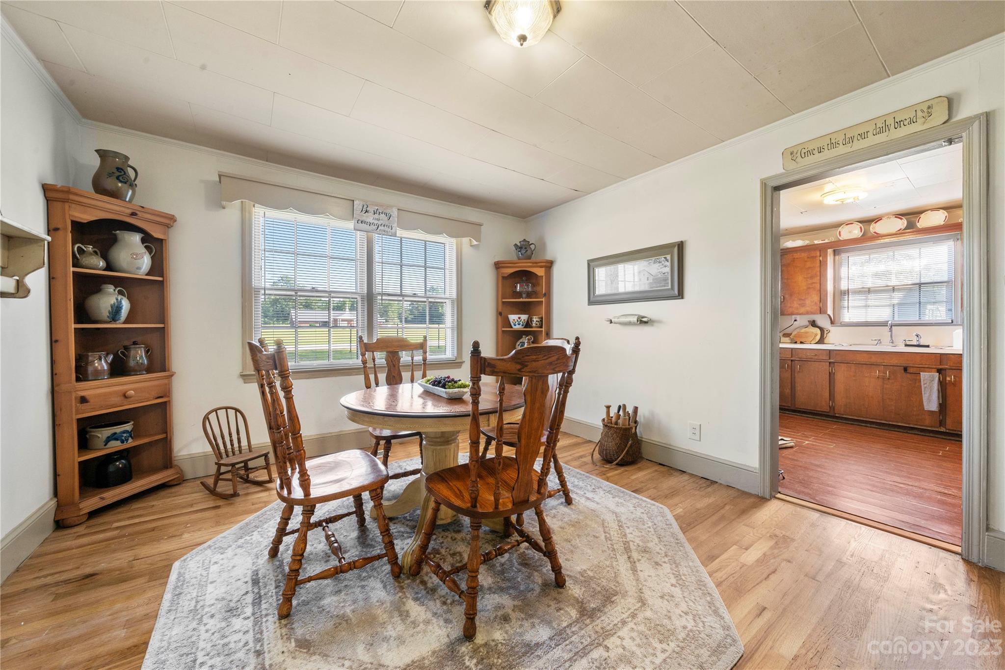 818 Old Buncombe Road Union, SC 29379 - Photo 12 of 27 a view of a dining room with furniture and a window