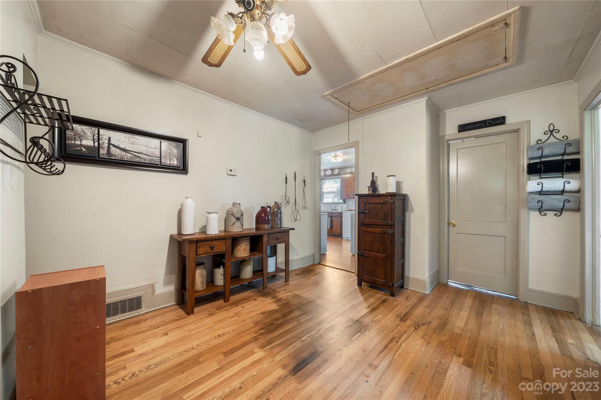 818 Old Buncombe Road Union, SC 29379 - Photo 15 of 27 a view of a dining room with furniture and wooden floor