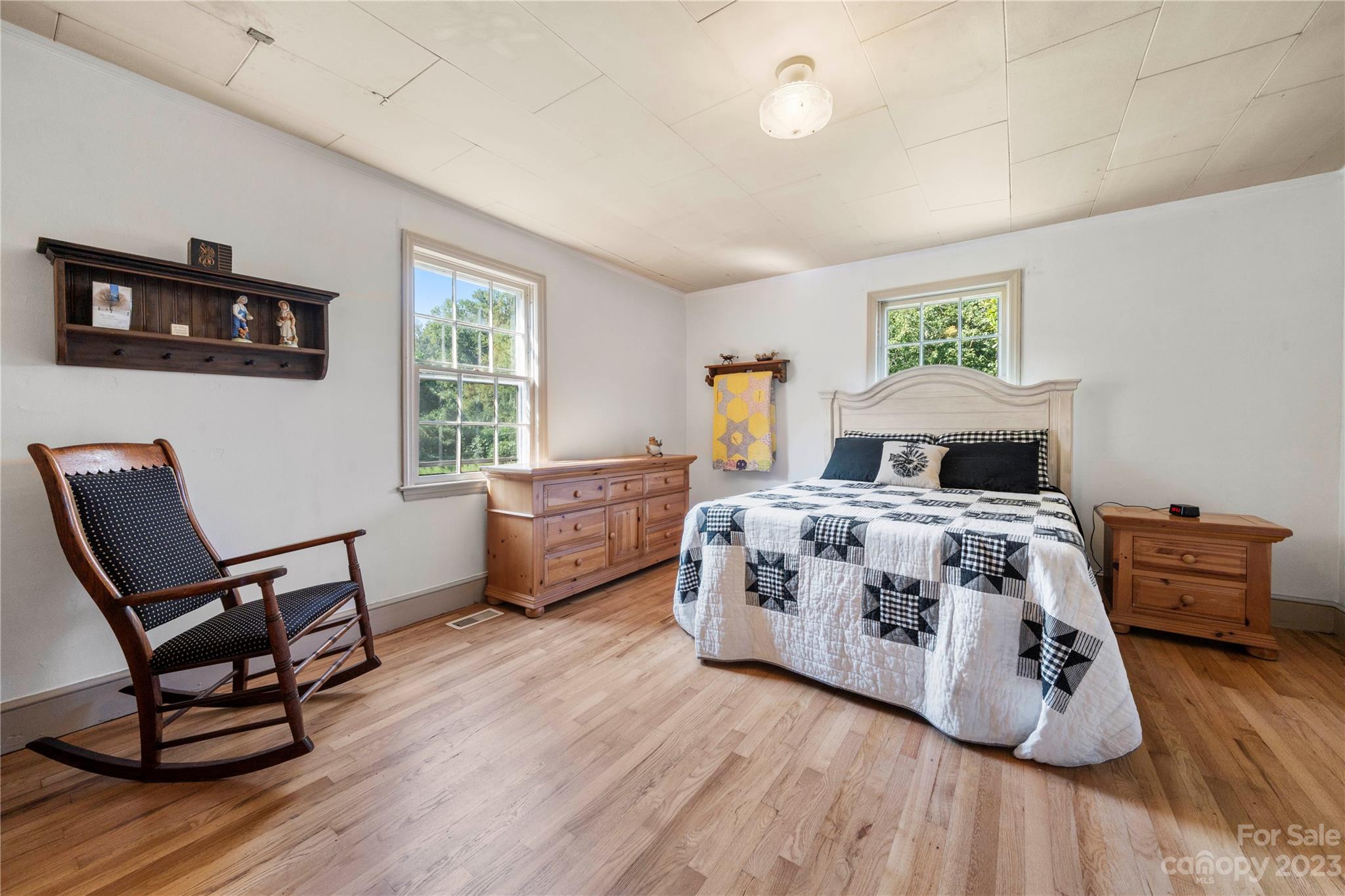 818 Old Buncombe Road Union, SC 29379 - Photo 18 of 27 a bedroom with a bed and wooden floor