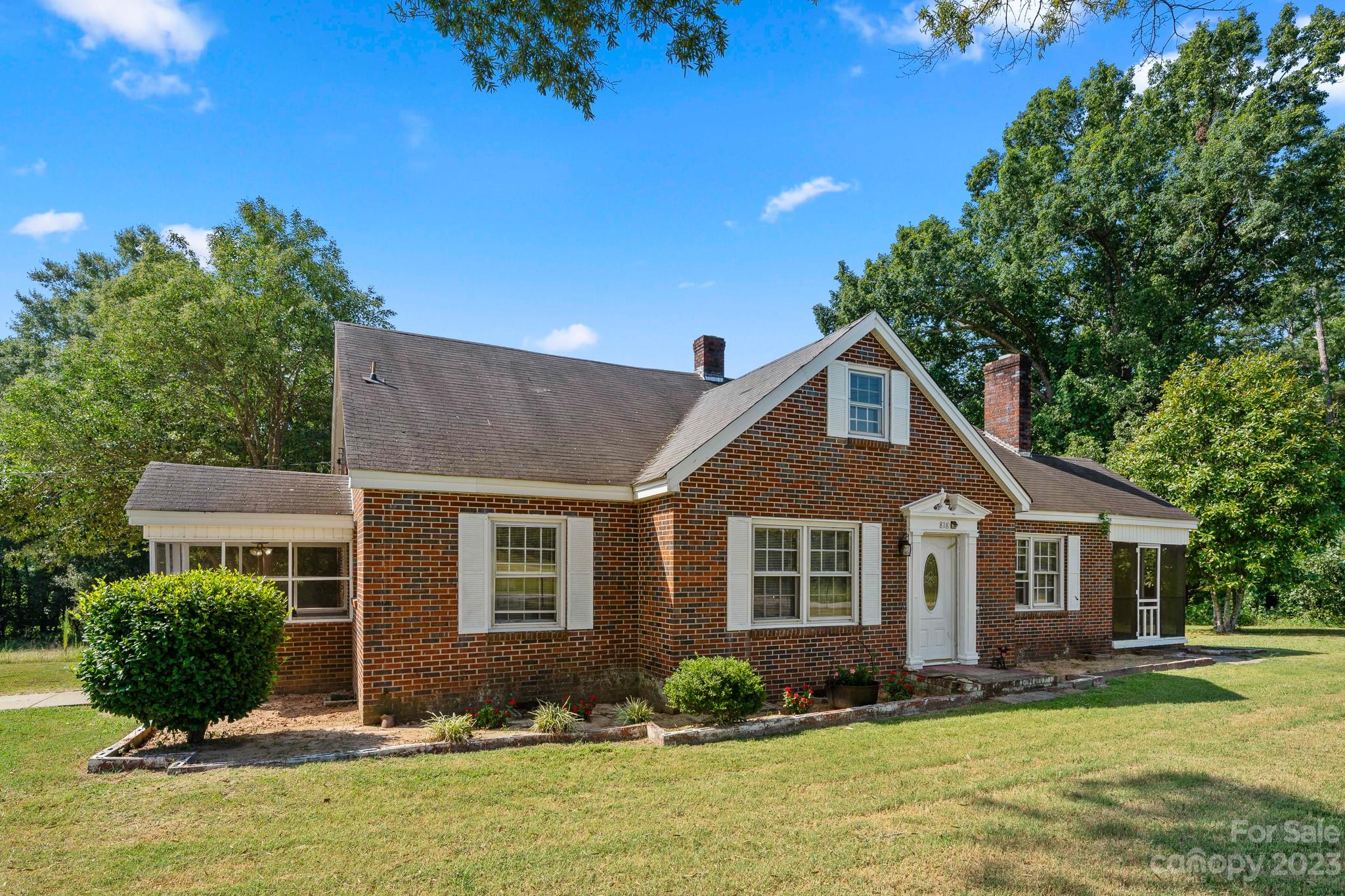 818 Old Buncombe Road Union, SC 29379 - Photo 2 of 27 a front view of a house with a yard