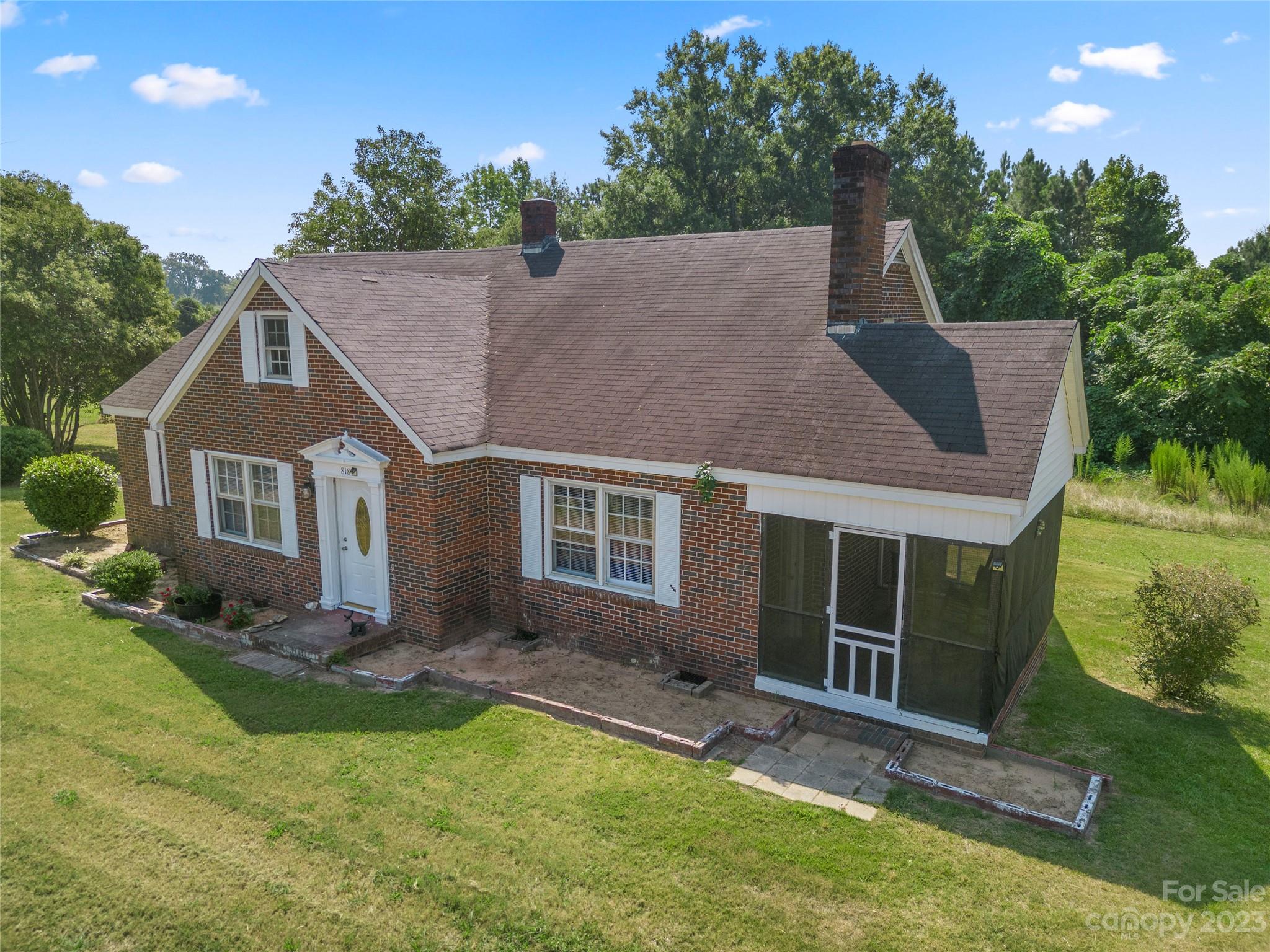 818 Old Buncombe Road Union, SC 29379 - Photo 24 of 27 a aerial view of a house with swimming pool next to a yard
