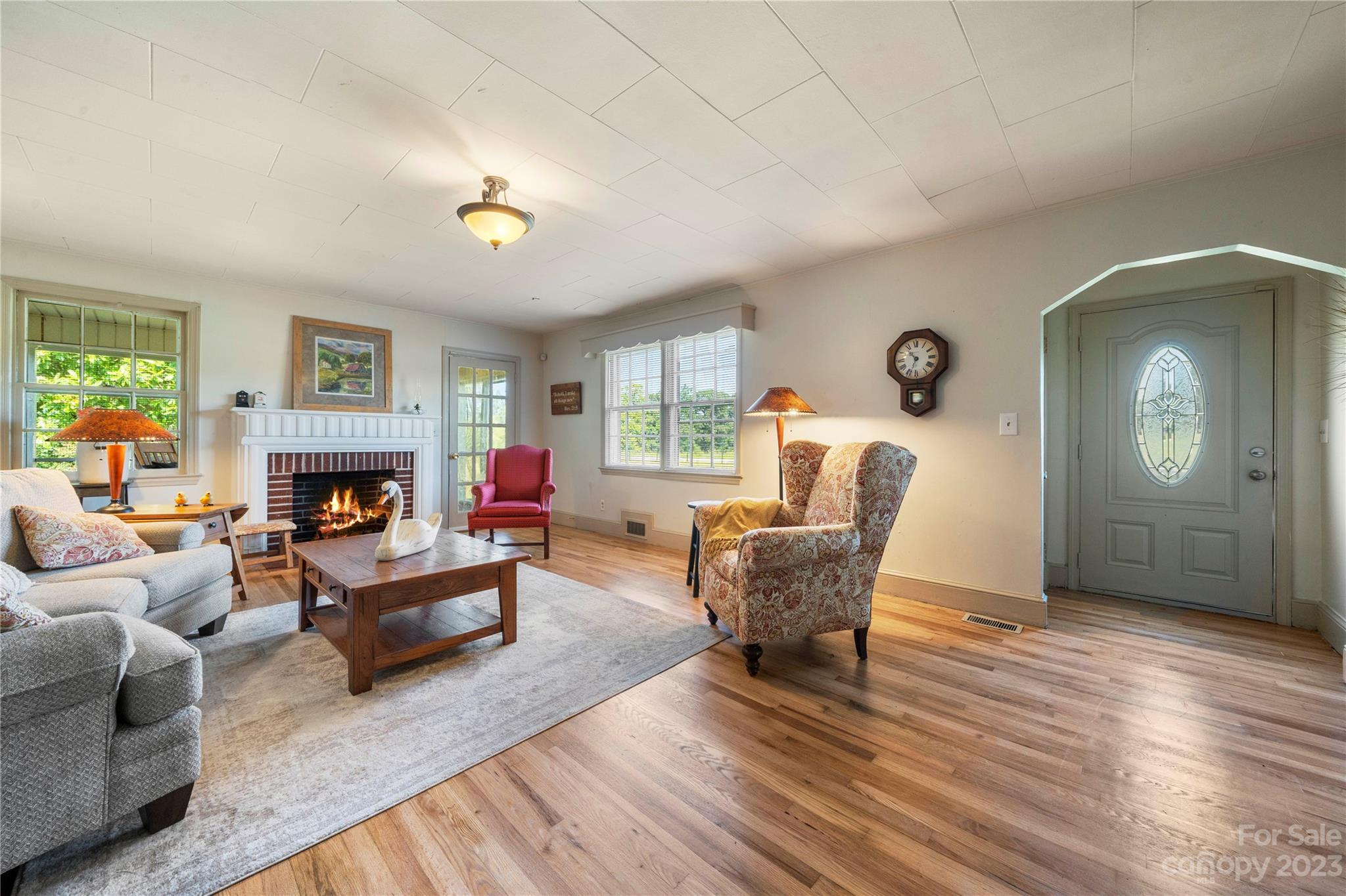 818 Old Buncombe Road Union, SC 29379 - Photo 8 of 27 a living room with furniture and a fireplace