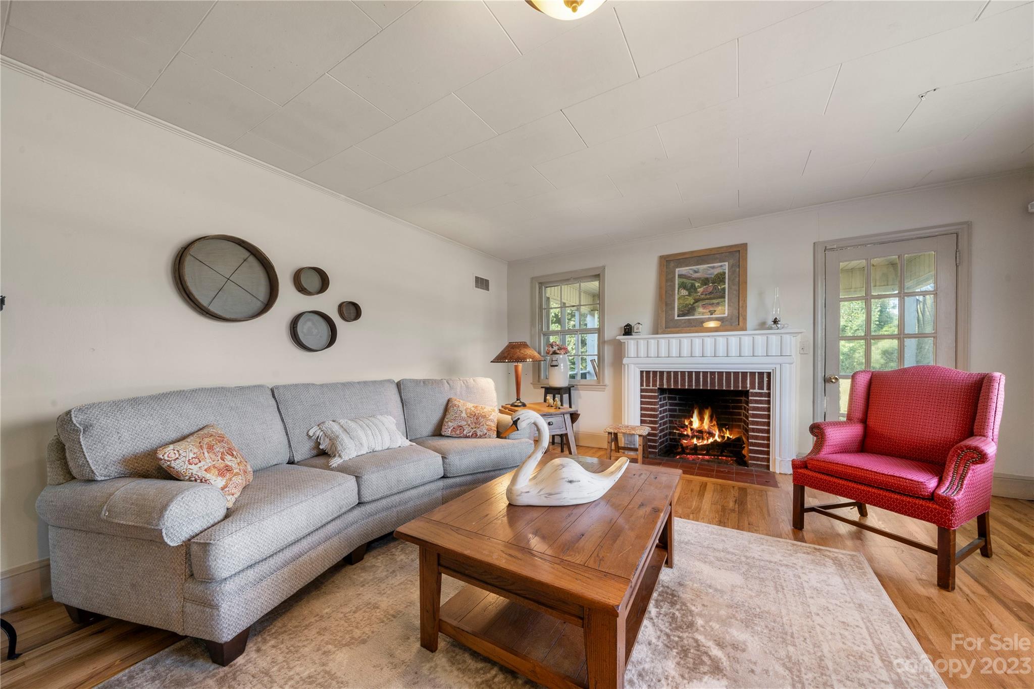 818 Old Buncombe Road Union, SC 29379 - Photo 9 of 27 a living room with furniture and a fireplace