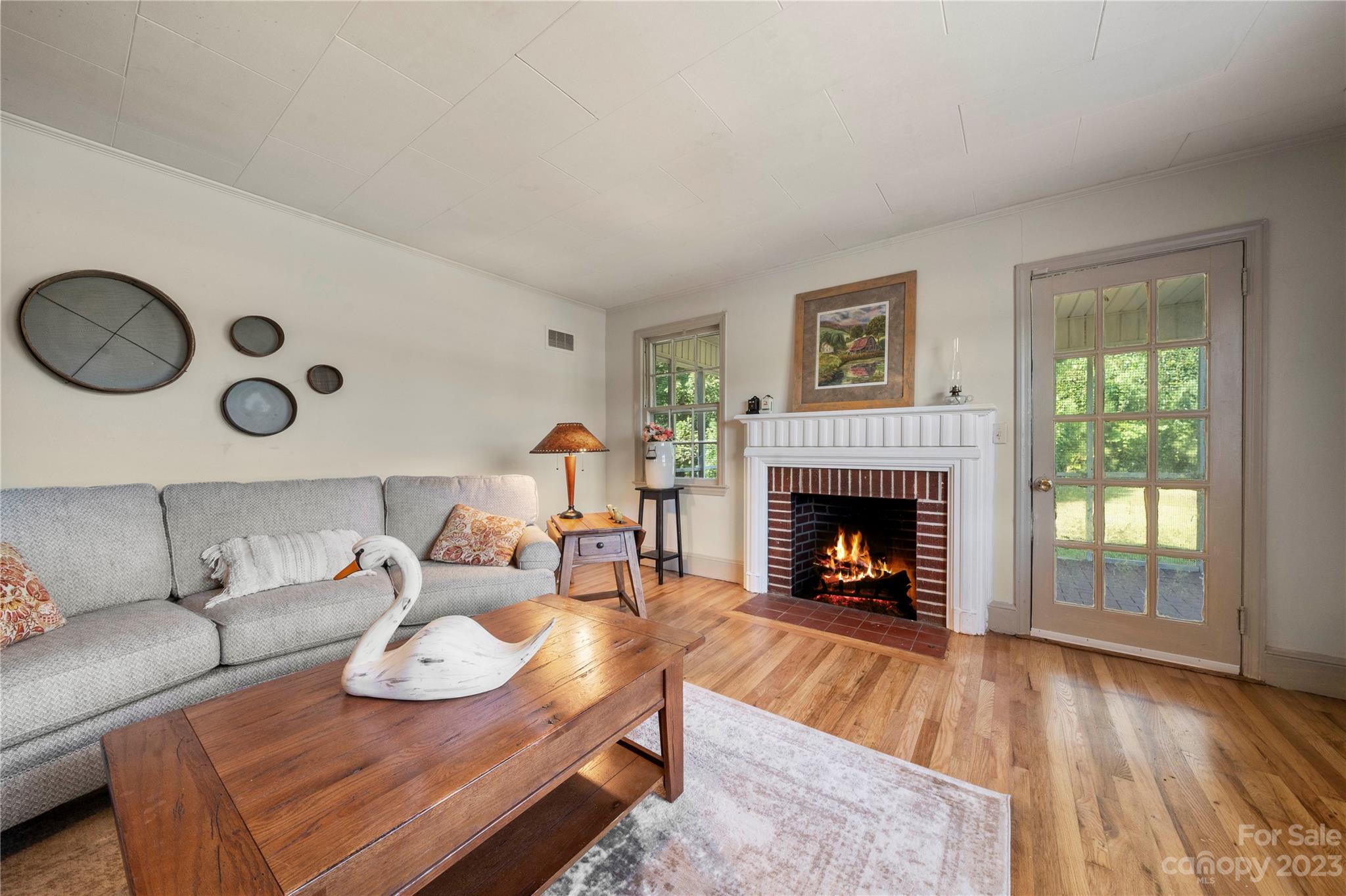 818 Old Buncombe Road Union, SC 29379 - Photo 10 of 27 a living room with furniture and a fireplace