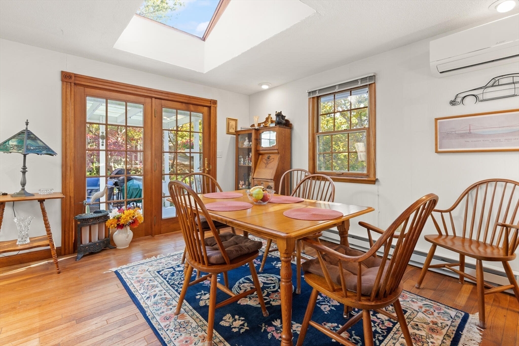 109 Riverview Road Gloucester, MA 01930 - Photo 16 of 42 a view of a dining room with furniture and wooden floor