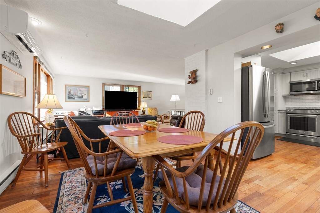 109 Riverview Road Gloucester, MA 01930 - Photo 18 of 42 a view of a dining room with furniture