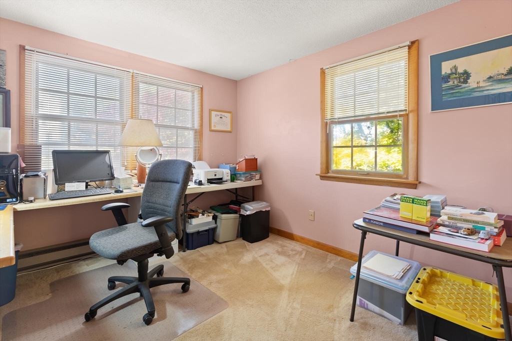 109 Riverview Road Gloucester, MA 01930 - Photo 23 of 42 a view of a workspace with furniture and a window
