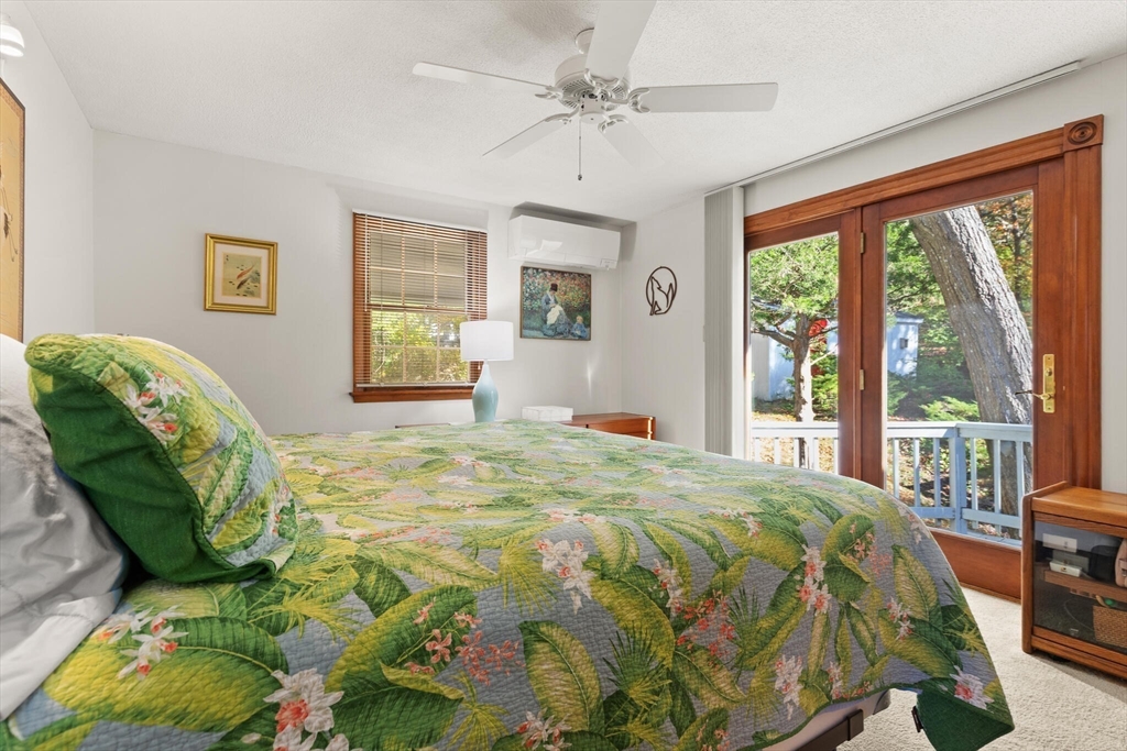 109 Riverview Road Gloucester, MA 01930 - Photo 25 of 42 a bedroom with a bed and a window