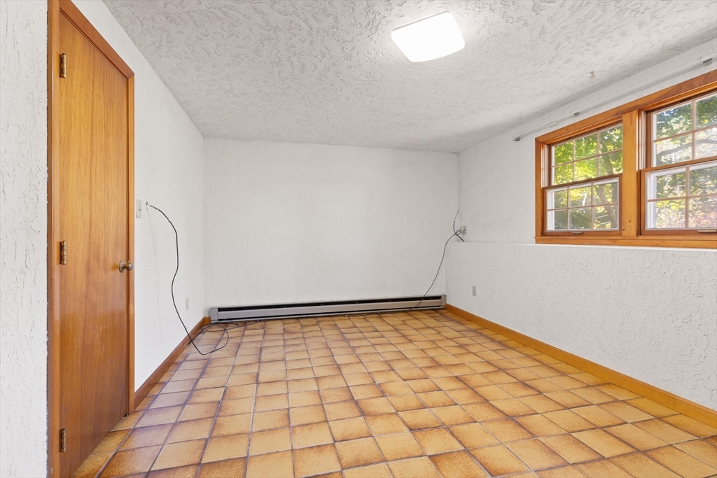 109 Riverview Road Gloucester, MA 01930 - Photo 27 of 42 a view of an empty room and window