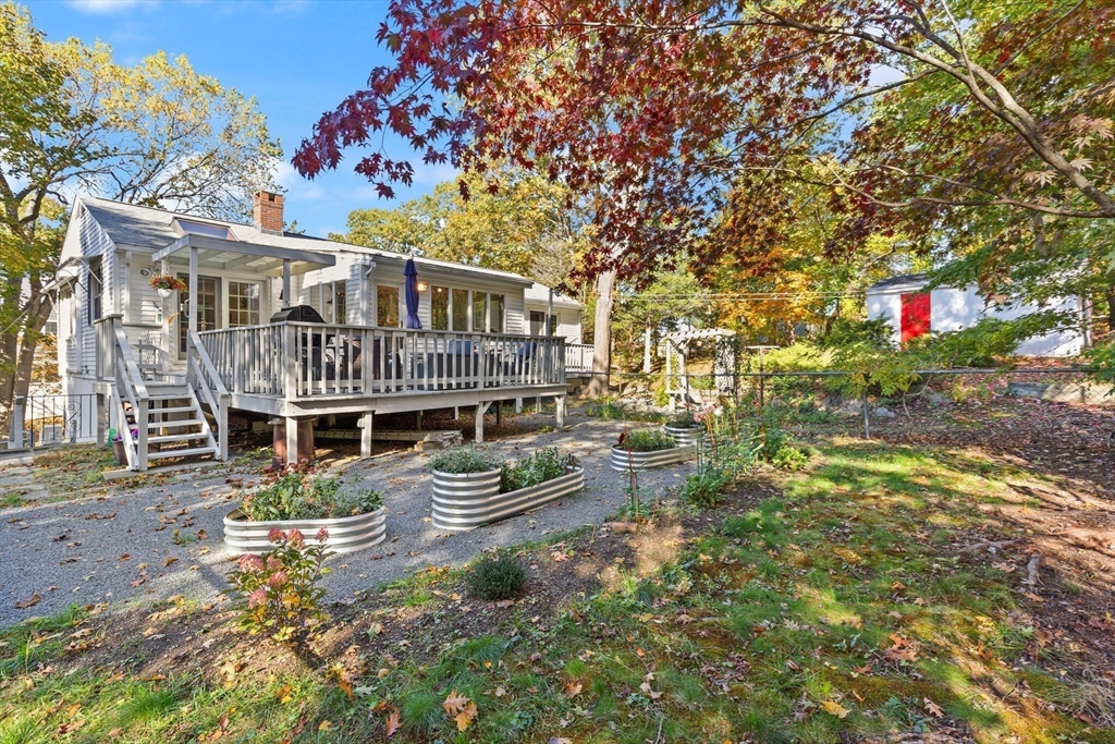109 Riverview Road Gloucester, MA 01930 - Photo 35 of 42 a view of a house with a yard
