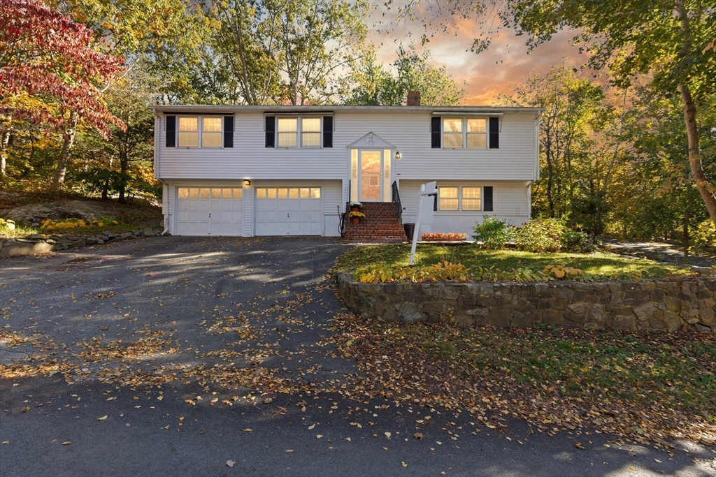 109 Riverview Road Gloucester, MA 01930 - Photo 40 of 42 a front view of a house with a yard