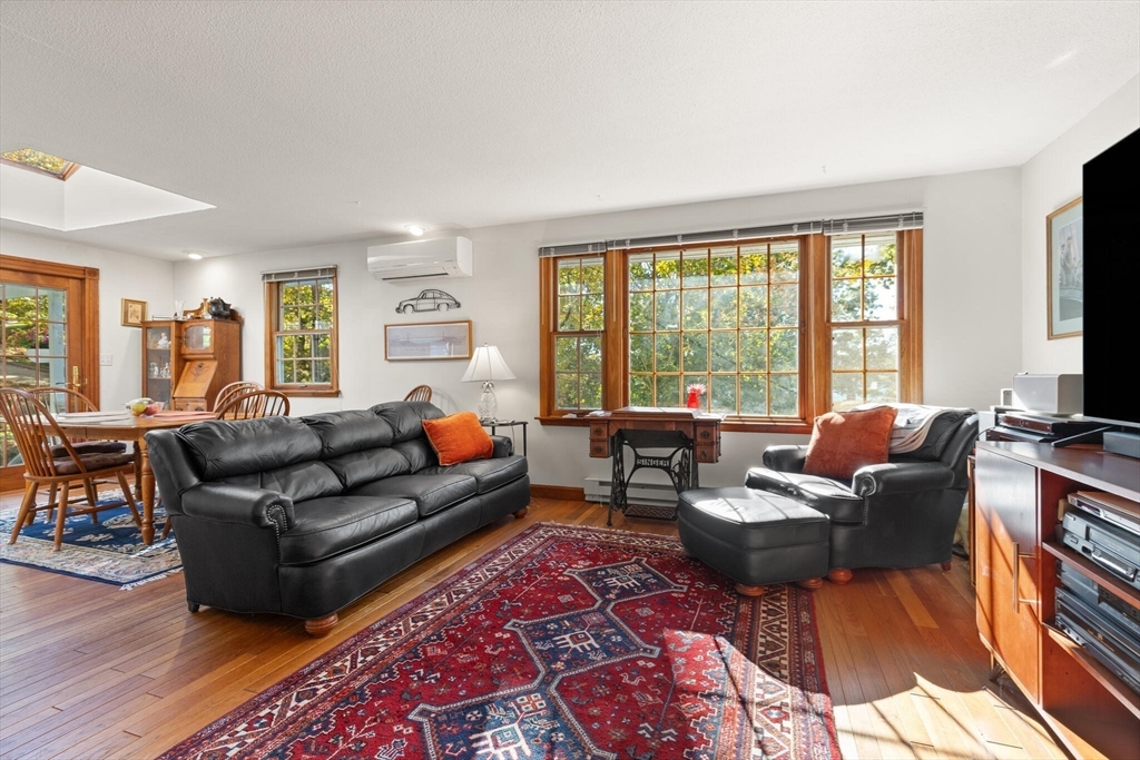 109 Riverview Road Gloucester, MA 01930 - Photo 6 of 42 a living room with furniture and a flat screen tv