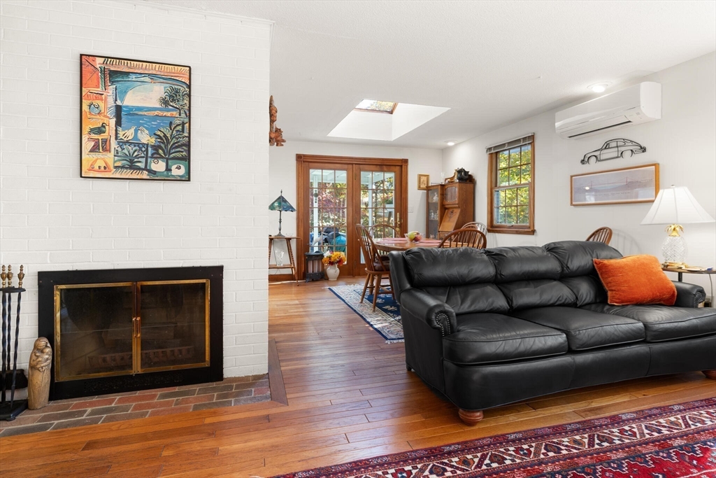 109 Riverview Road Gloucester, MA 01930 - Photo 9 of 42 a living room with furniture and a fireplace