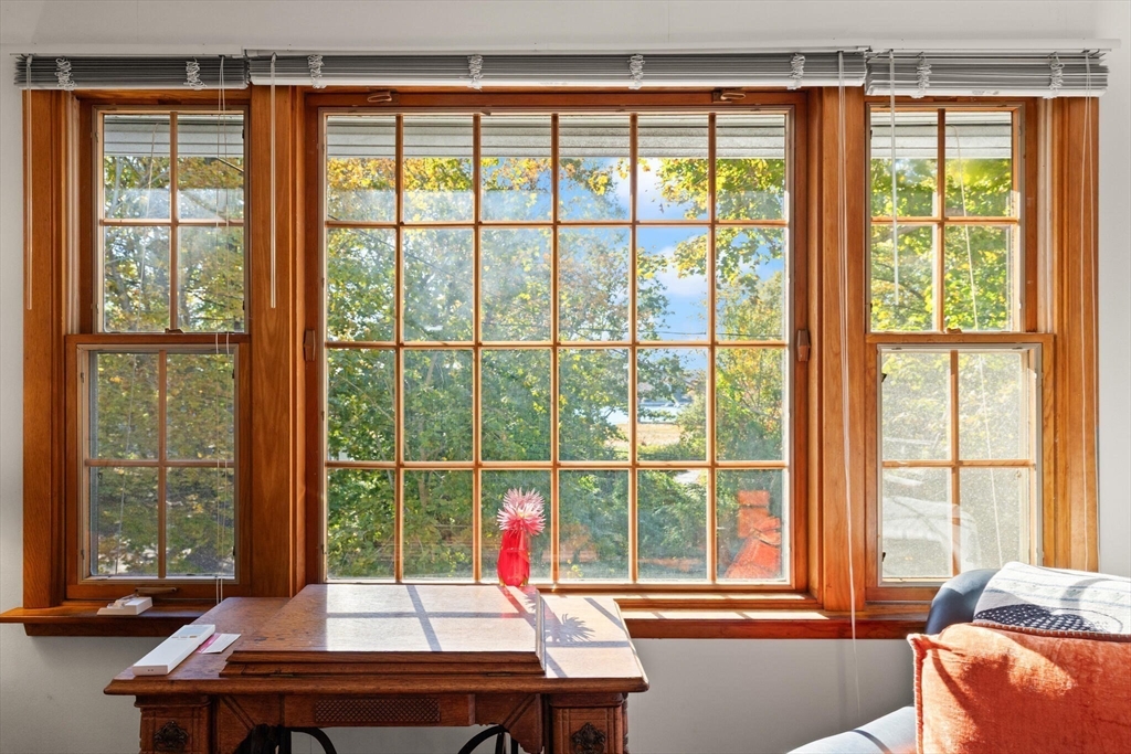 109 Riverview Road Gloucester, MA 01930 - Photo 10 of 42 a view of a room with a large window and dining table