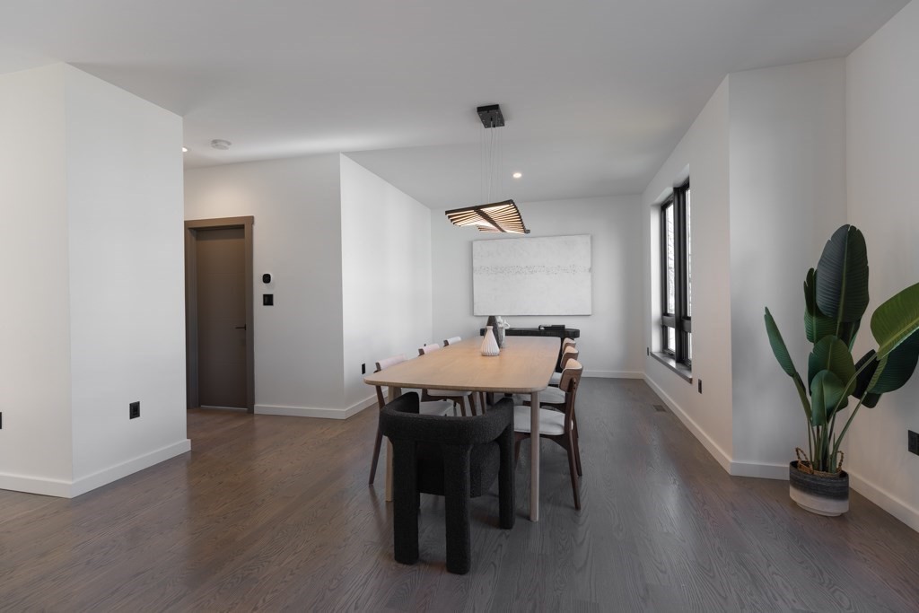 46 Beverly Road Arlington, MA 02474 - Photo 14 of 42 a view of a dining room with furniture and wooden floor