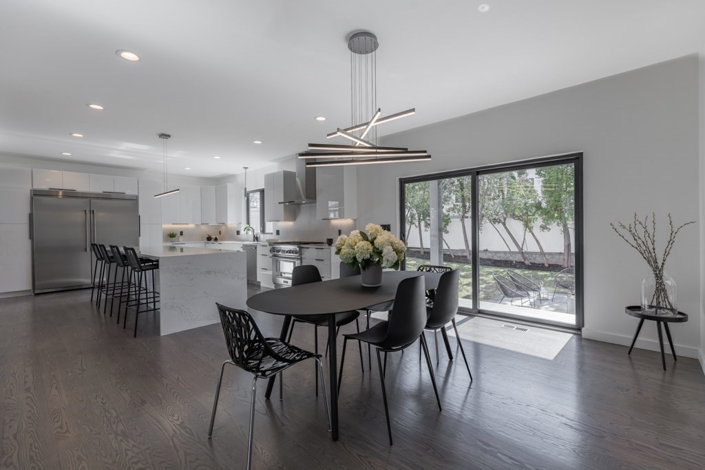 46 Beverly Road Arlington, MA 02474 - Photo 15 of 42 a view of a dining room with furniture window and wooden floor