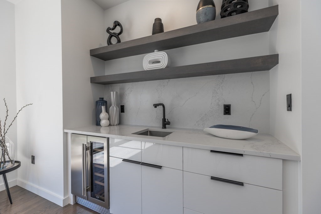 46 Beverly Road Arlington, MA 02474 - Photo 16 of 42 a kitchen with a sink and cabinets