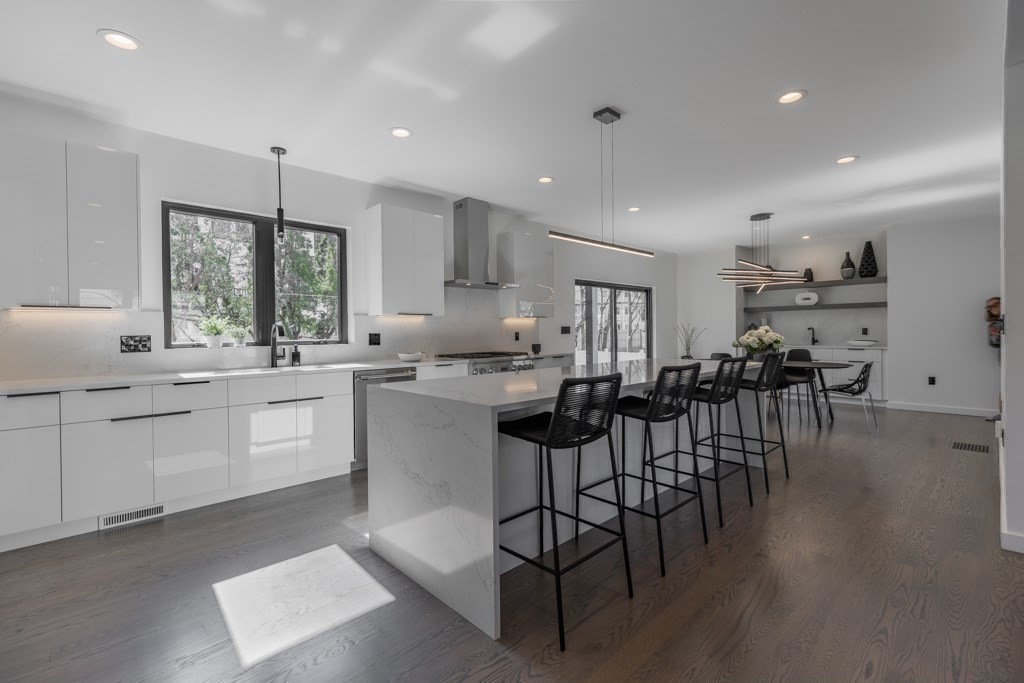 46 Beverly Road Arlington, MA 02474 - Photo 17 of 42 a kitchen with sink cabinets and wooden floor