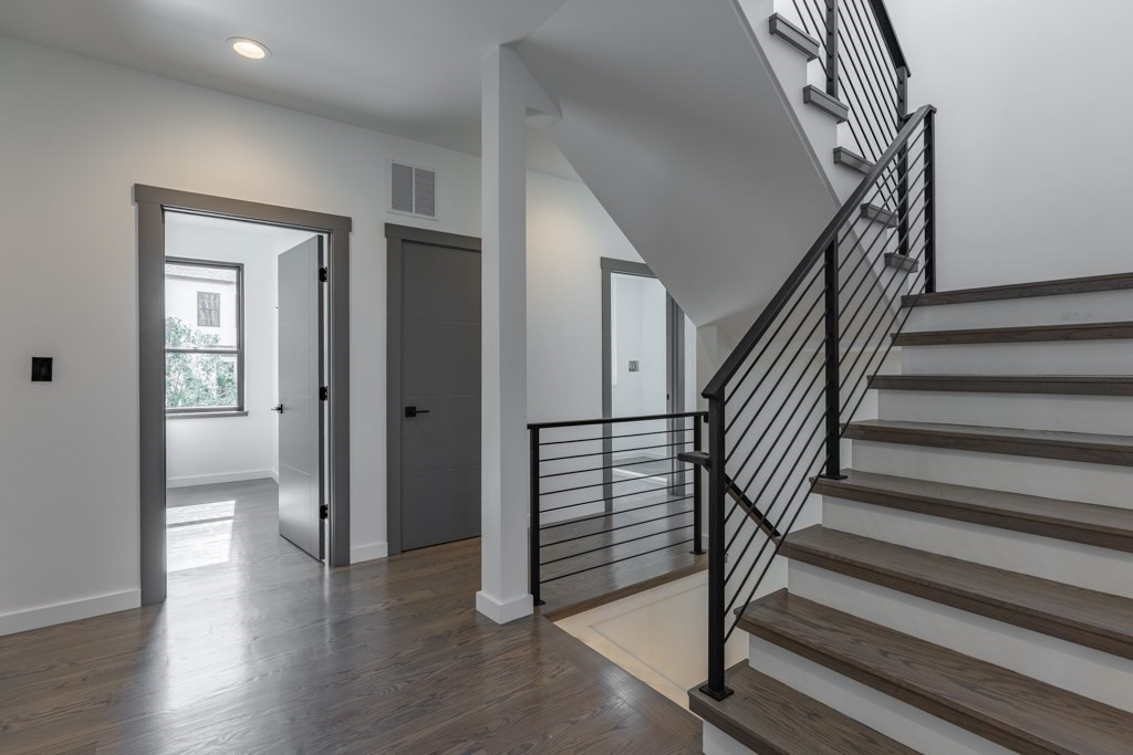 46 Beverly Road Arlington, MA 02474 - Photo 28 of 42 a view of a hallway with wooden floor and entryway