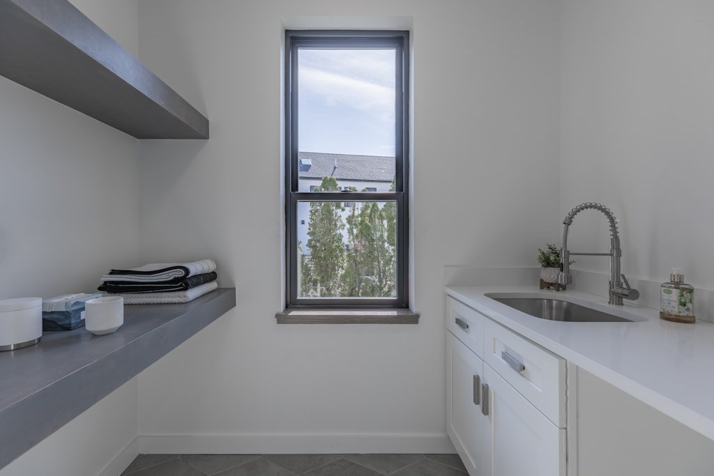 46 Beverly Road Arlington, MA 02474 - Photo 29 of 42 a bathroom with a sink and a toilet
