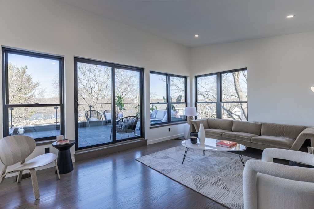 46 Beverly Road Arlington, MA 02474 - Photo 3 of 42 a living room with furniture and a large window