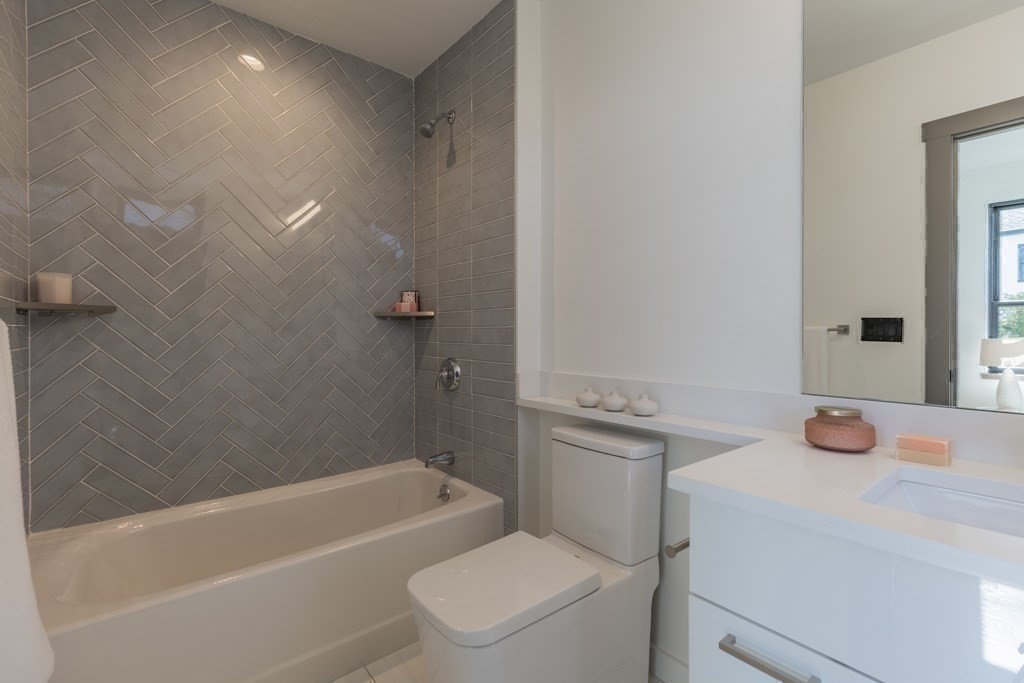 46 Beverly Road Arlington, MA 02474 - Photo 35 of 42 a bathroom with a sink a toilet and shower