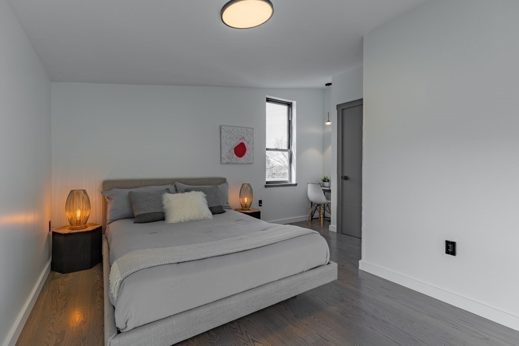 46 Beverly Road Arlington, MA 02474 - Photo 36 of 42 a bedroom with a bed and a window