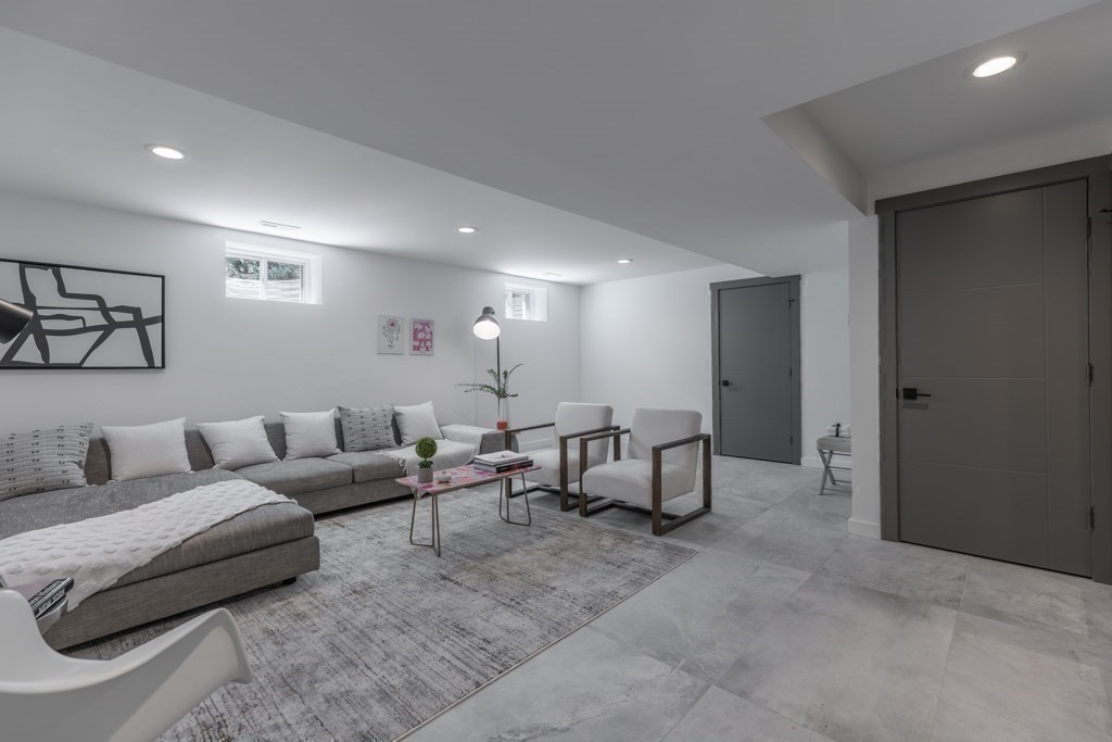 46 Beverly Road Arlington, MA 02474 - Photo 40 of 42 a living room with furniture and a window