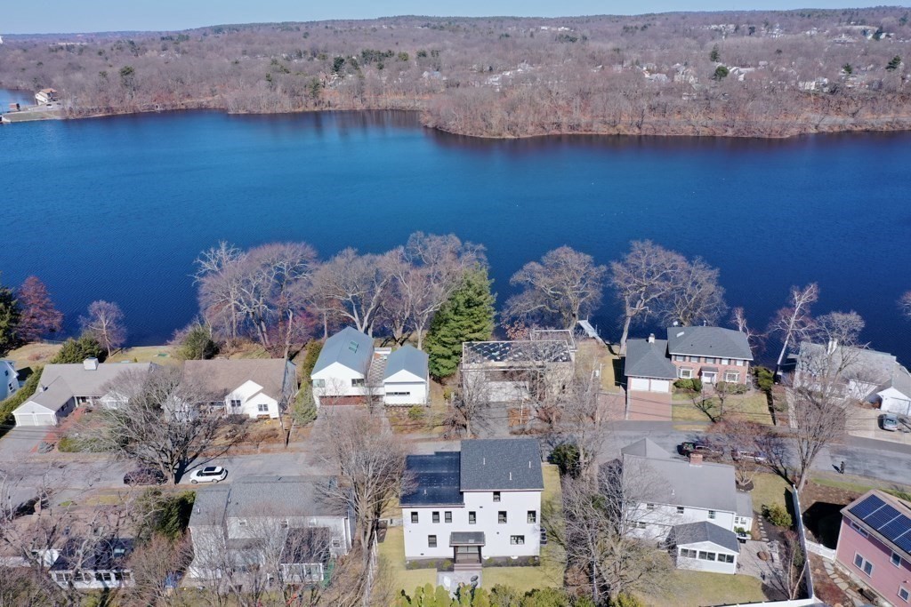 46 Beverly Road Arlington, MA 02474 - Photo 6 of 42 a view of folding clothes and water heater