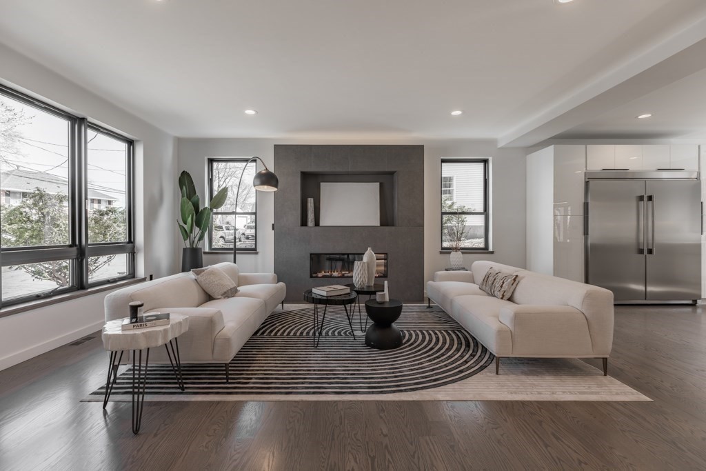 46 Beverly Road Arlington, MA 02474 - Photo 10 of 42 a living room with furniture and a large window