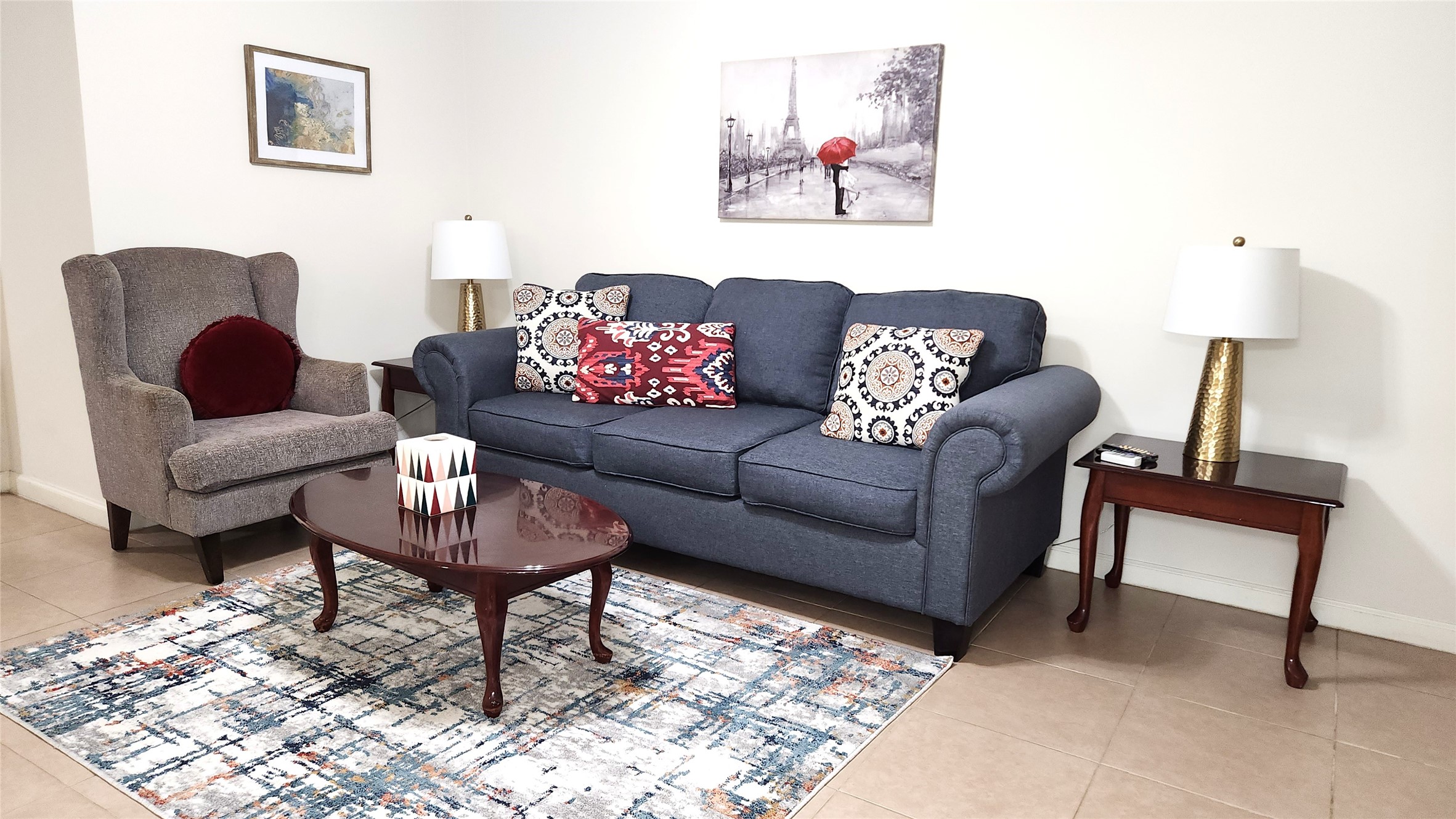 4727 West Alabama Street, Unit 104 Houston, TX 77027 - Photo 4 of 10 a living room with furniture and a rug