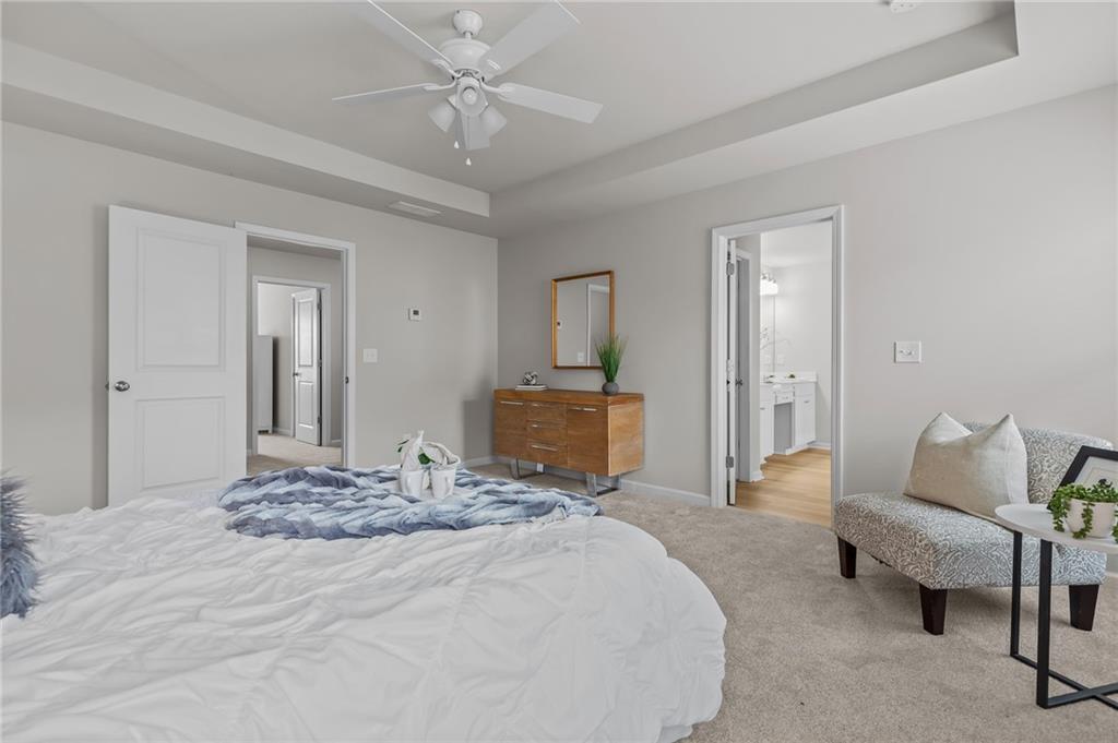 325 Winston Circle Canton, GA 30114 - Photo 23 of 38 a bedroom with a bed and a couch