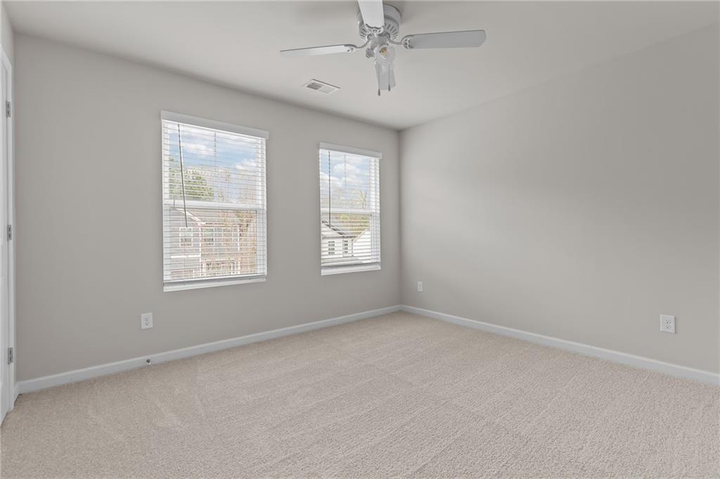 325 Winston Circle Canton, GA 30114 - Photo 28 of 38 an empty room with a window