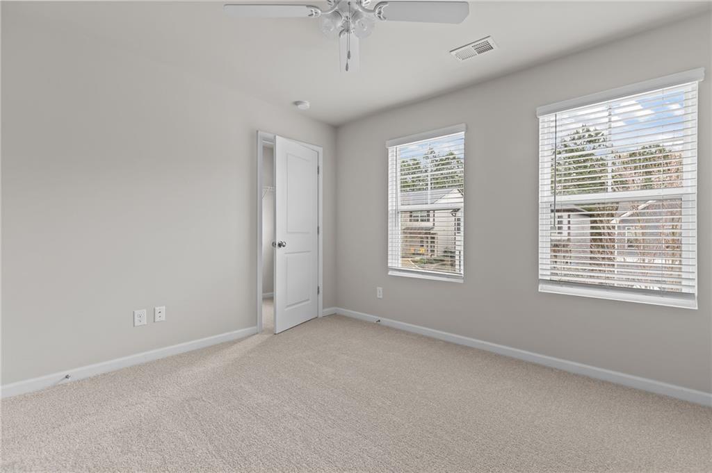 325 Winston Circle Canton, GA 30114 - Photo 29 of 38 a view of an empty room with a window