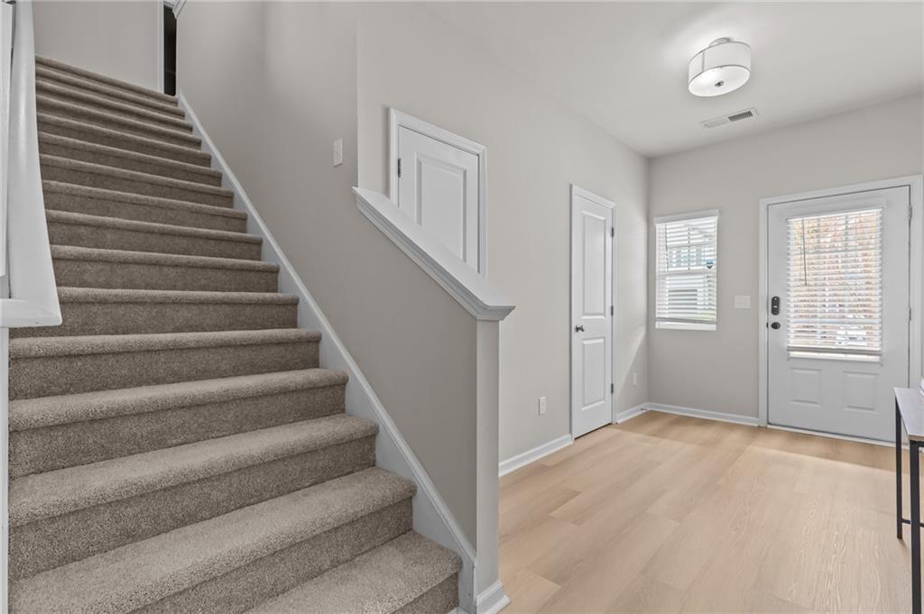 325 Winston Circle Canton, GA 30114 - Photo 5 of 38 a view of an entryway with staircase