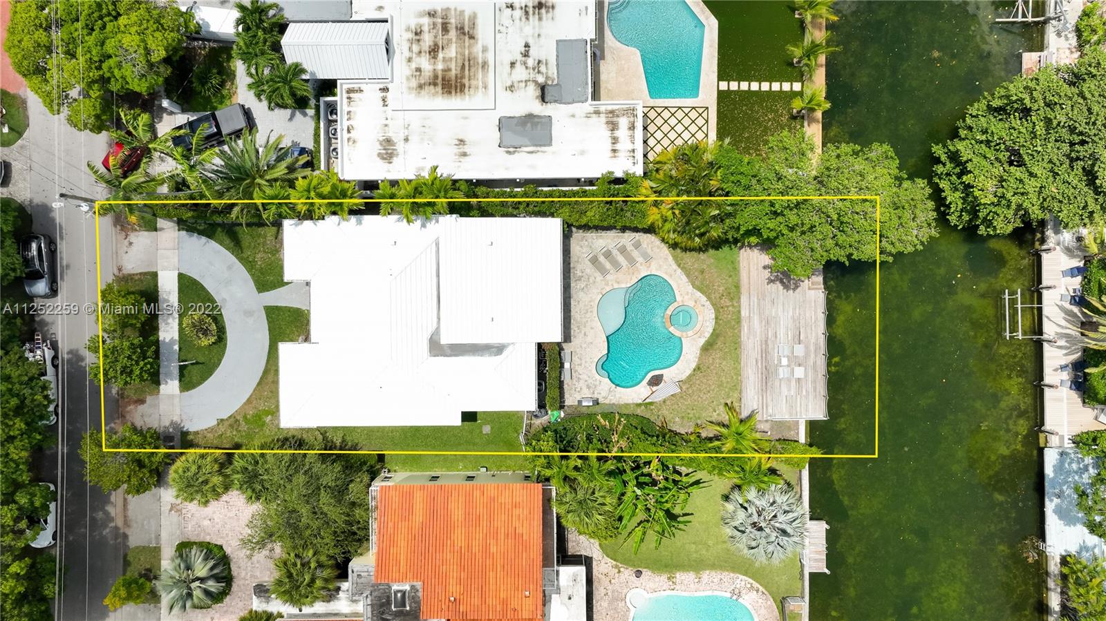 1757 Daytonia Road Miami Beach, FL 33141 - Photo 3 of 30 an aerial view of a house with a garden and swimming pool