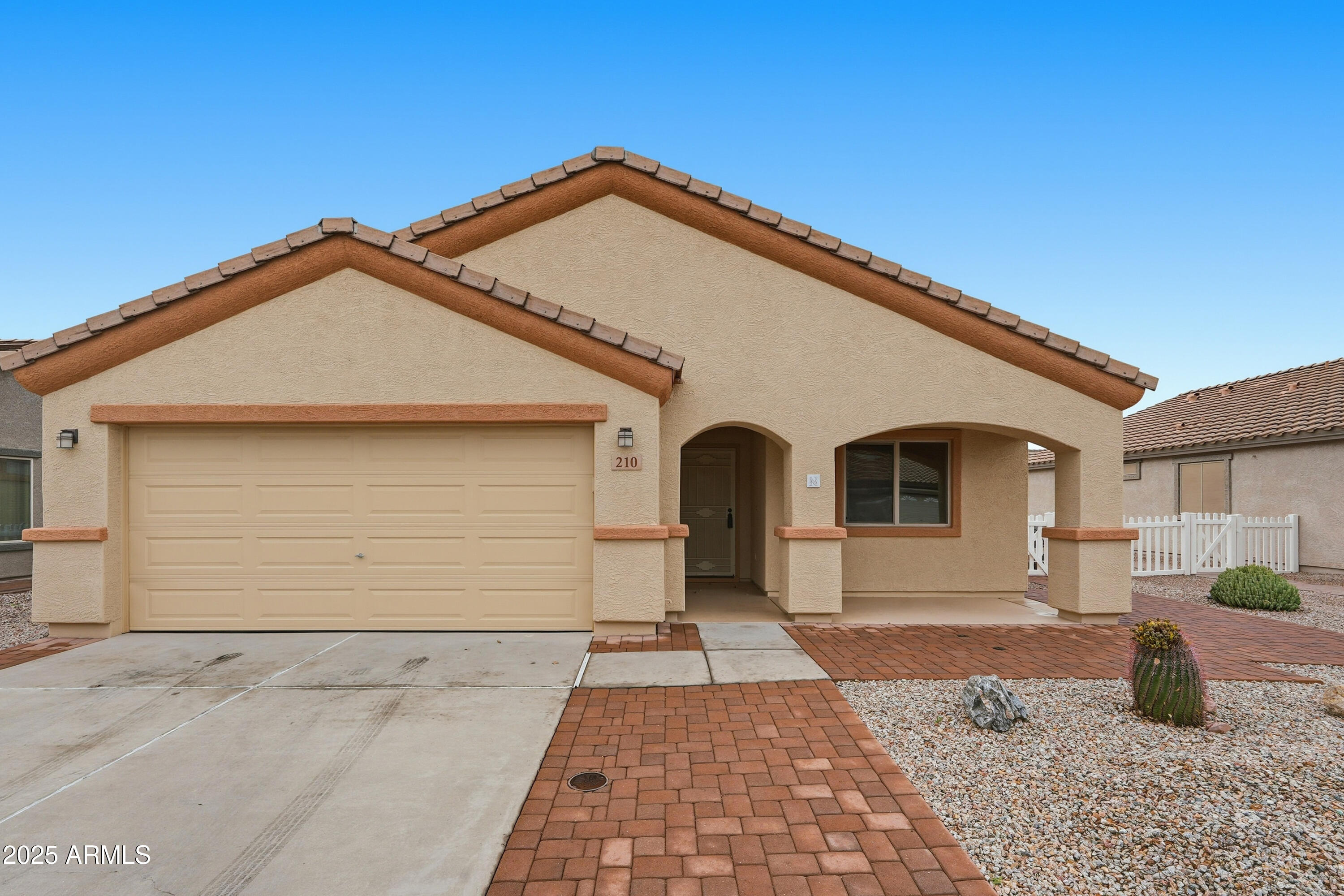 2101 South Meridian Road, Unit 210 Apache Junction, AZ 85120 - Photo 1 of 32 a front view of a house