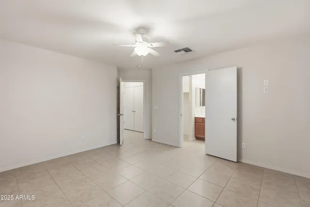 an empty room with a bathroom