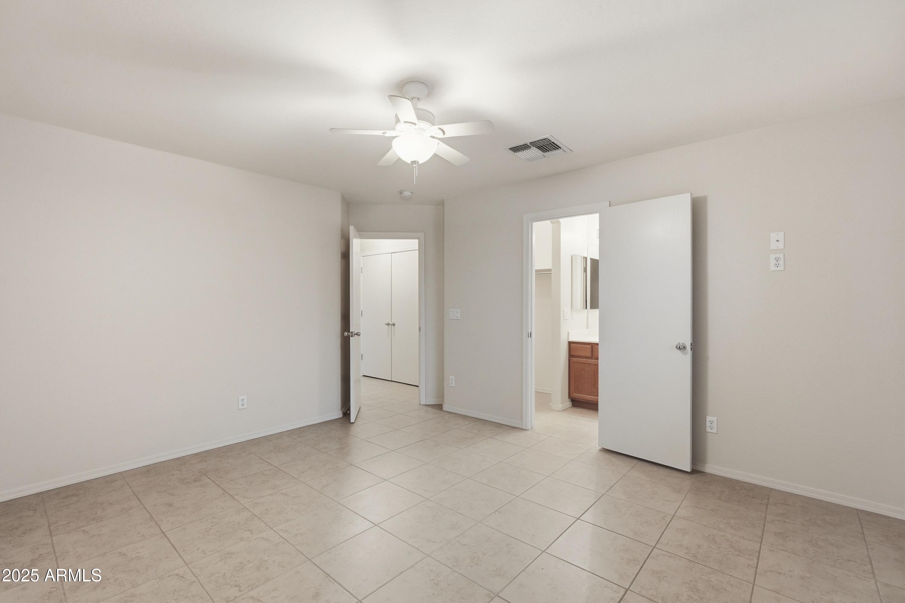 2101 South Meridian Road, Unit 210 Apache Junction, AZ 85120 - Photo 20 of 32 an empty room with a bathroom