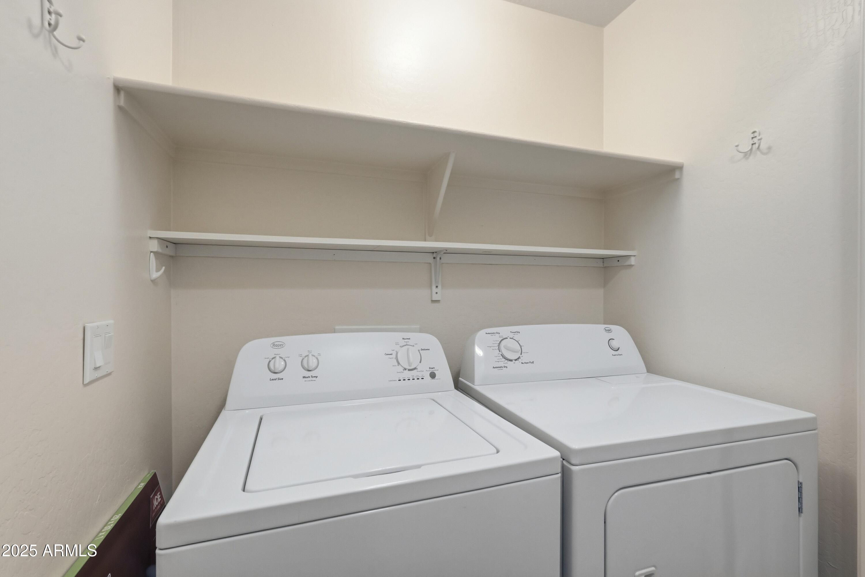 2101 South Meridian Road, Unit 210 Apache Junction, AZ 85120 - Photo 25 of 32 a utility room with dryer and washer