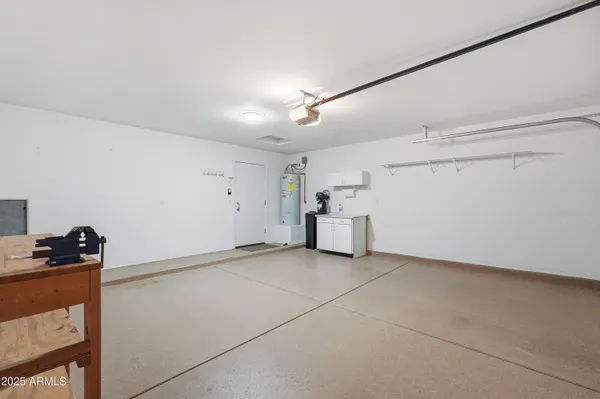 a view of a storage & utility room with closet