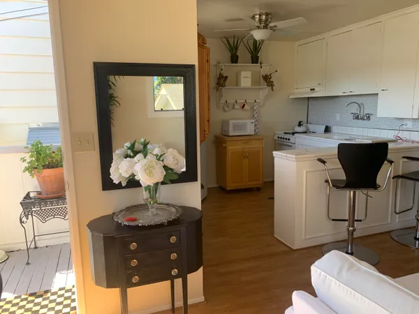 a kitchen with a sink and a refrigerator