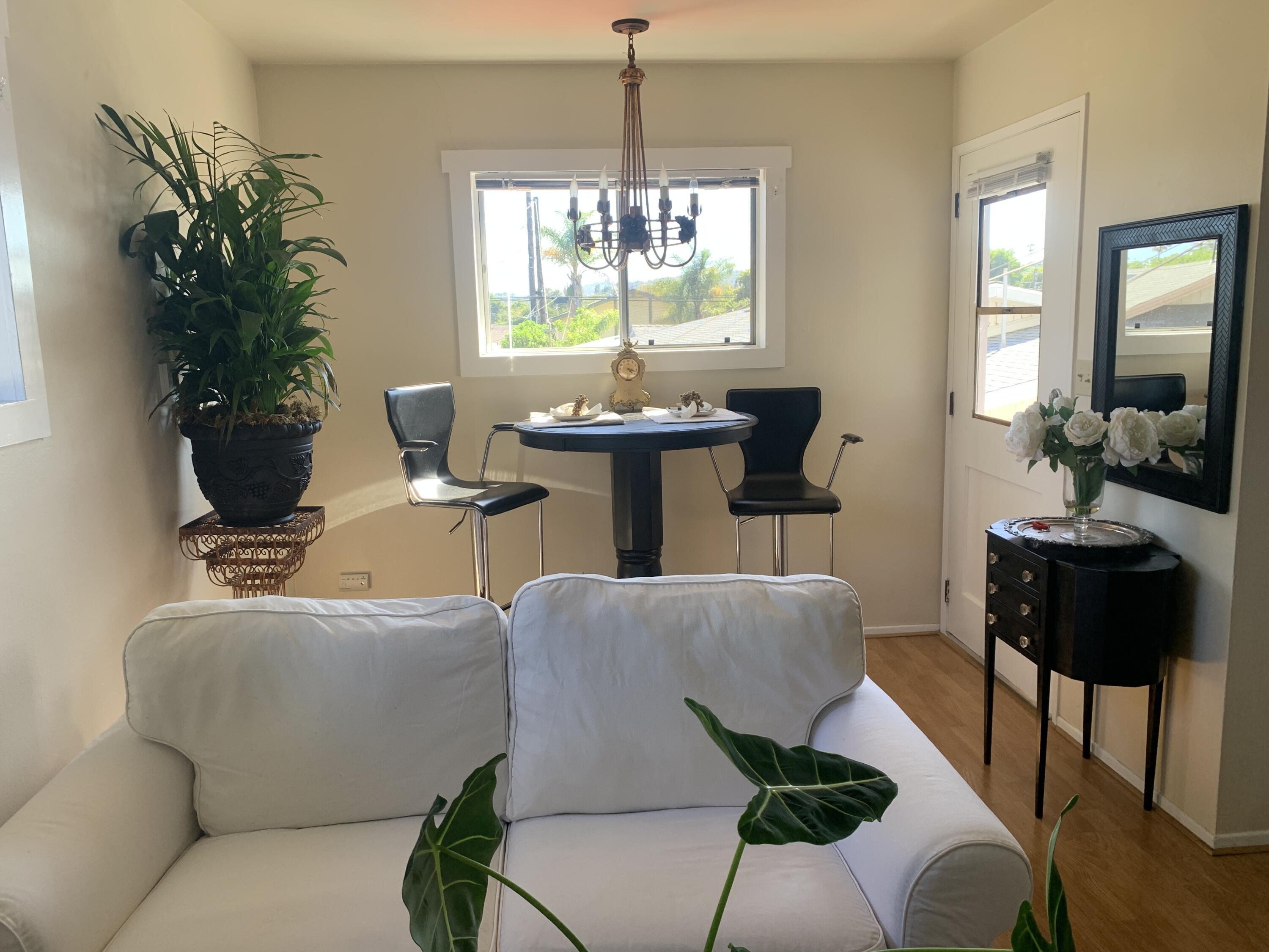2528 De La Vina Street Santa Barbara, CA 93105 - Photo 15 of 32 a living room with furniture and a chandelier