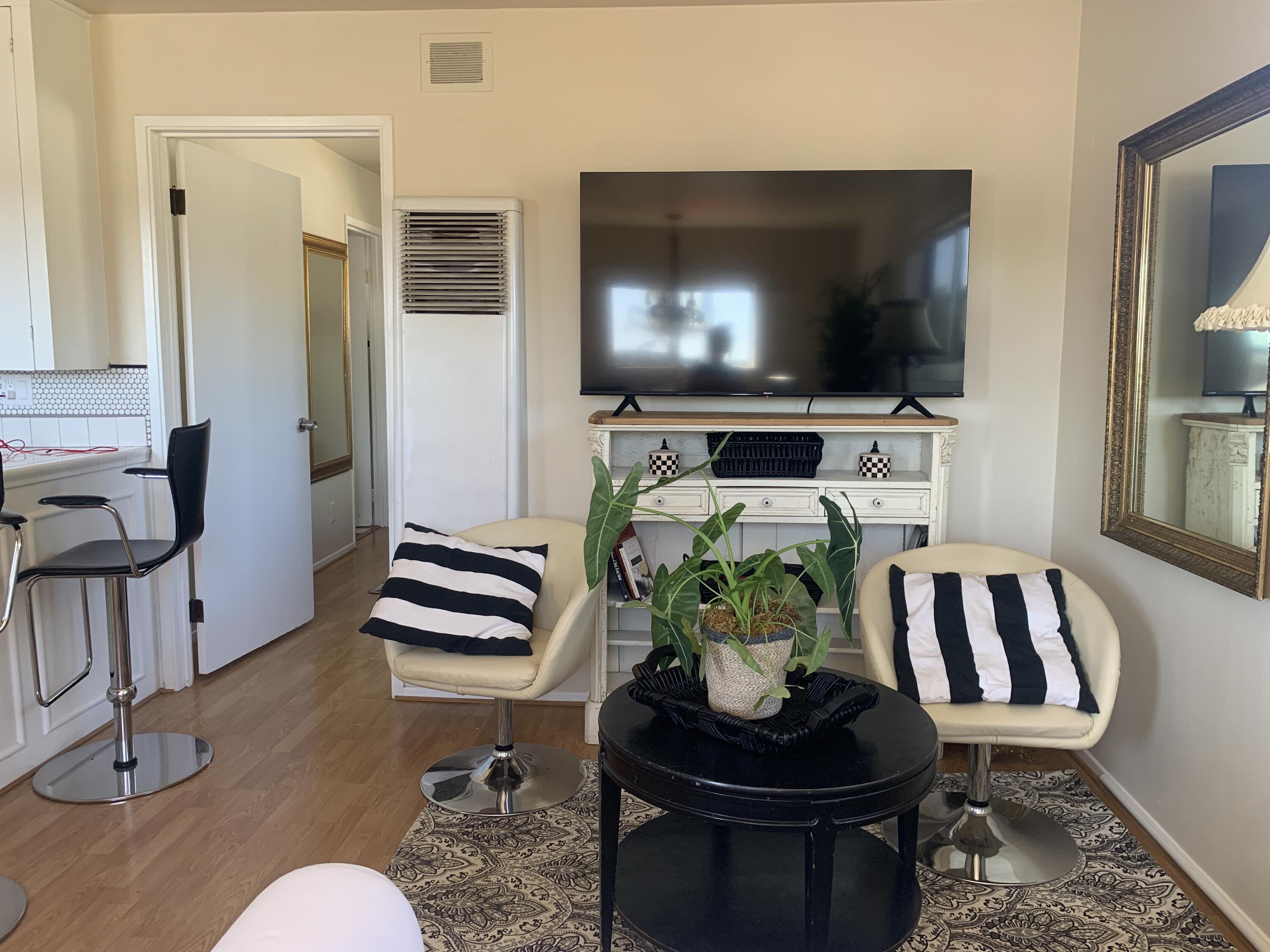 2528 De La Vina Street Santa Barbara, CA 93105 - Photo 17 of 32 a living room with furniture and a flat screen tv