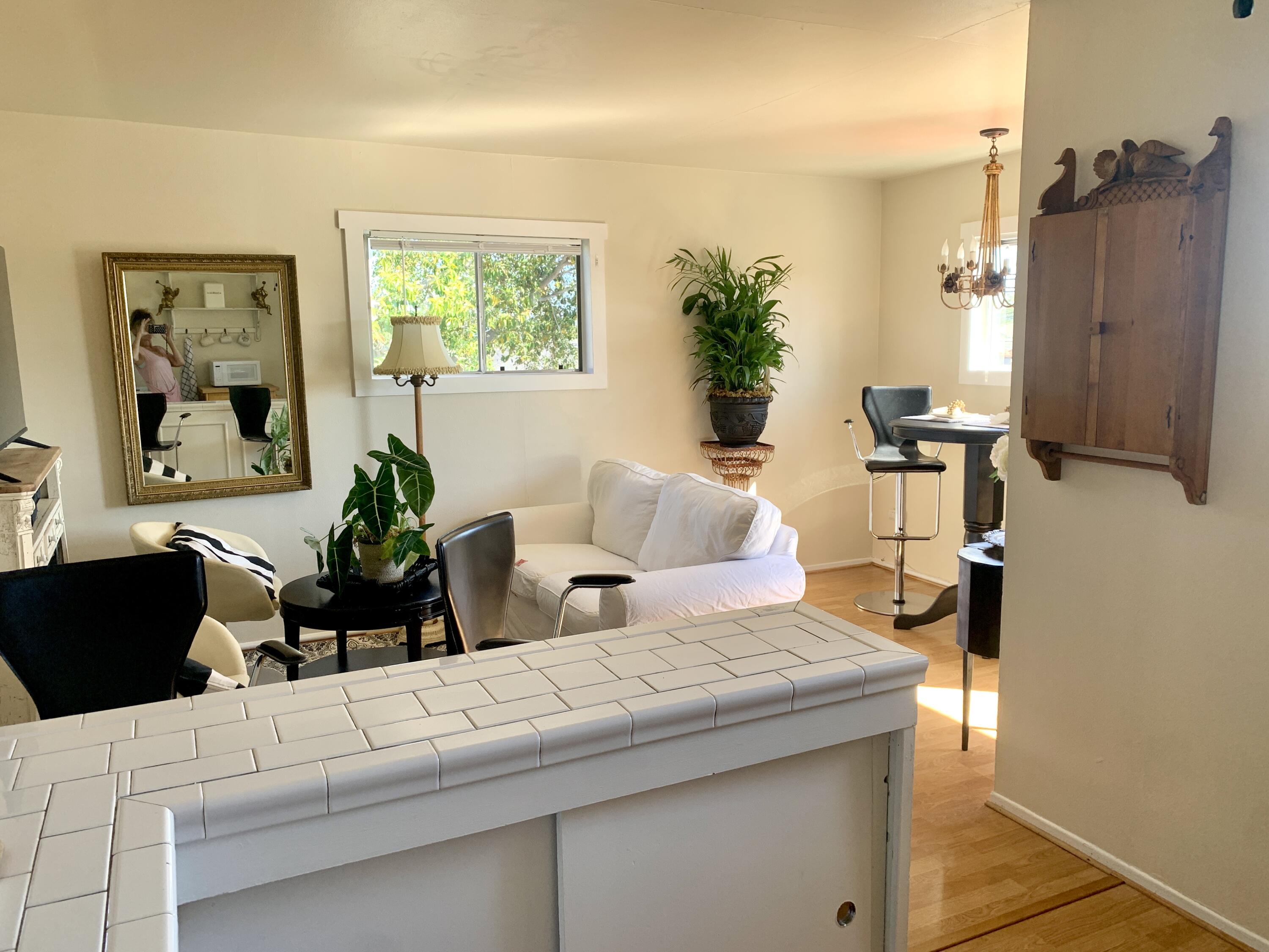 2528 De La Vina Street Santa Barbara, CA 93105 - Photo 24 of 32 a living room with furniture and a window