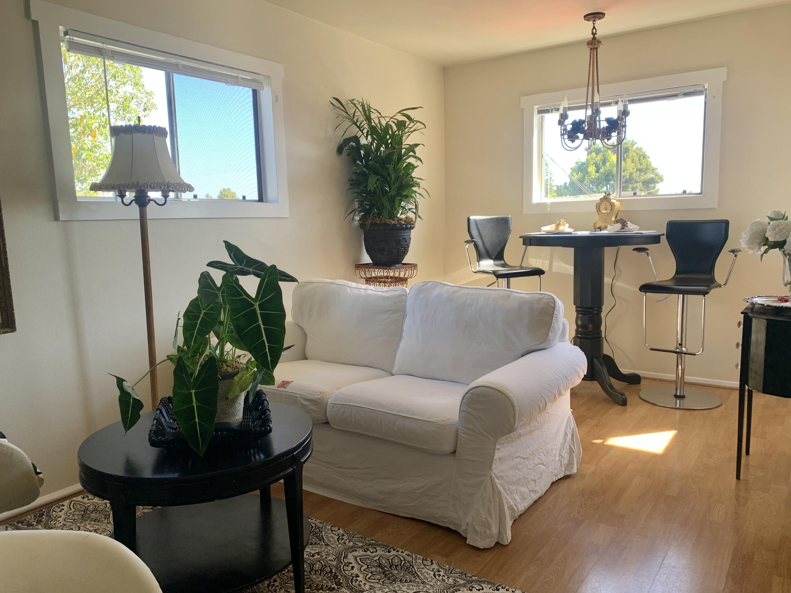 2528 De La Vina Street Santa Barbara, CA 93105 - Photo 28 of 32 a living room with furniture and a potted plant